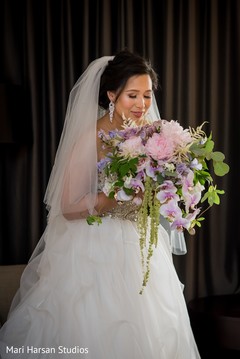 Indian bride glowing in her wedding attire. Indian bride glowing in her wedding attire.