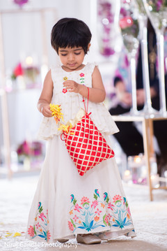 Lovely capture of Indian wedding flower girl. Lovely capture of Indian wedding flower girl.