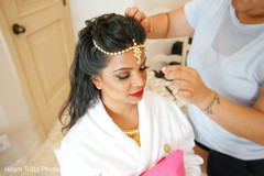 Indian bride getting her tikka on. Indian bride getting her tikka on.