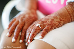 Indian bride's mehndi art closeup capture. Indian bride's mehndi art closeup capture.