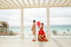 Indian bride and groom first look scene. Indian bride and groom first look scene.