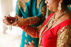 Indian bride getting her bangles on closeup capture. Indian bride getting her bangles on closeup capture.