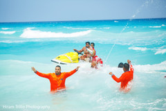 Marvelous capture of Indian bride and groom on water jet bike. Marvelous capture of Indian bride and groom on water jet bike.