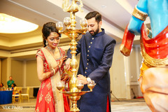Indian bride and groom during sangeet celebration Indian bride and groom during sangeet celebration