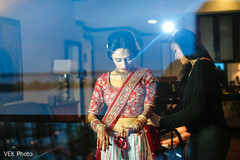 Adorable indian bride getting ready