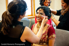 Lovely bride getting her makeup done. Lovely bride getting her makeup done.
