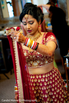 See the Final touch ups for this charming Indian bride. See the Final touch ups for this charming Indian bride.