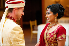 Indian bride and groom's romantic first look moment Indian bride and groom's romantic first look moment