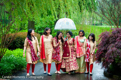 Sweet Indian bride and bridesmaids posing for photo shoot. Sweet Indian bride and bridesmaids posing for photo shoot.