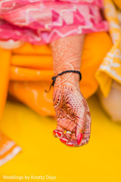 Indian bride haldi ritual bracelet capture. Indian bride haldi ritual bracelet capture.
