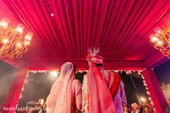 Happy Indian couple during their wedding ceremony capture. Happy Indian couple during their wedding ceremony capture.