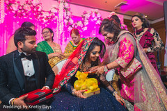 Indian bride and groom getting gifts from parents. Indian bride and groom getting gifts from parents.