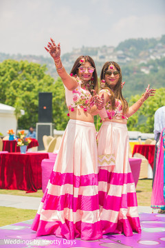 Lovely Indian bridesmaids on their mehndi party outfits. Lovely Indian bridesmaids on their mehndi party outfits.