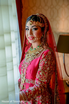 Adorable indian bride looking out the window Adorable indian bride looking out the window