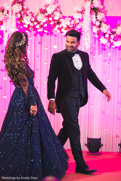 Indian bride and groom performing at their wedding reception. Indian bride and groom performing at their wedding reception.