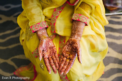 Indian bride showing mehndi art Indian bride showing mehndi art