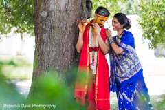 Indian bride and groom getting Turmeric past on. Indian bride and groom getting Turmeric past on.