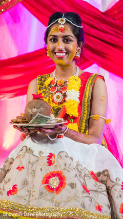Maharani holding the coconut at haldi ceremony. Maharani holding the coconut at haldi ceremony.