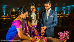 Indian bride and groom on a wedding ritual capture. Indian bride and groom on a wedding ritual capture.