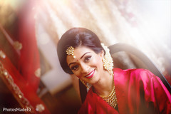 Beautiful indian bride being dolled up for her ceremony Beautiful indian bride being dolled up for her ceremony