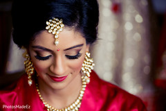 Indian bride glowing in her wedding attire. Indian bride glowing in her wedding attire.