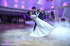 Lovely Indian couple enjoying their first dance capture. Lovely Indian couple enjoying their first dance capture.