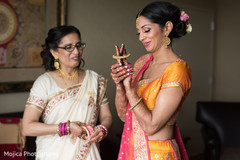 Maharani getting her bangles on. Maharani getting her bangles on.