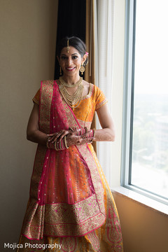 Beautiful Indian bride showing henna art. Beautiful Indian bride showing henna art.