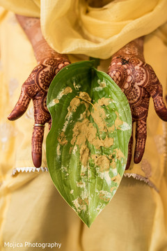 Turmeric paste on a leaf capture. Turmeric paste on a leaf capture.