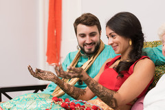Indian bride and groom during the mehndy celebration. Indian bride and groom during the mehndy celebration.