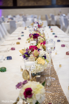 Indian wedding reception table setup. Indian wedding reception table setup.