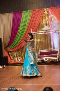 Indian bride dancing at her sangeet party. Indian bride dancing at her sangeet party.