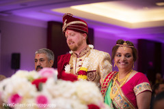 Indian groom making his entrance to wedding ceremony Indian groom making his entrance to wedding ceremony