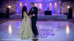Indian lovebirds having their first dance. Indian lovebirds having their first dance.
