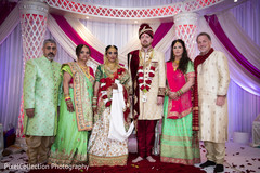Maharani and Raja with family wedding portrait. Maharani and Raja with family wedding portrait.