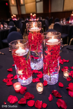 Delightful Indian wedding table glass cylinders decoration. Delightful Indian wedding table glass cylinders decoration.