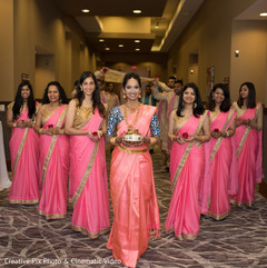 Indian bridesmaids entrance to wedding ceremony Indian bridesmaids entrance to wedding ceremony