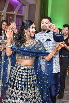 Maharani dancing with groom at reception dance. Maharani dancing with groom at reception dance.