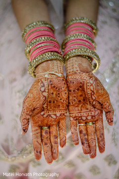 Indian bride showing marvelous mehndi art Indian bride showing marvelous mehndi art
