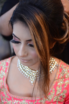 Dazzling indian bride getting her hair style done. Dazzling indian bride getting her hair style done.