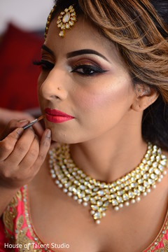 Lovely bride getting her makeup done. Lovely bride getting her makeup done.