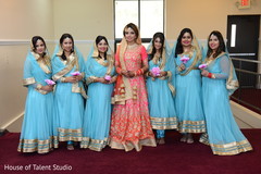 Sweet Indian bride and bridesmaids posing for photo shoot. Sweet Indian bride and bridesmaids posing for photo shoot.