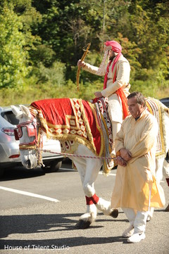 Elegant Indian groom riding baraat white horse. Elegant Indian groom riding baraat white horse.