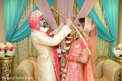 Indian bride and groom exchanging garlands ceremony. Indian bride and groom exchanging garlands ceremony.