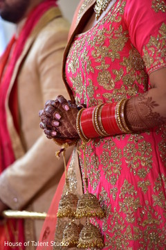 Stunning Indian bride with her wedding ceremony accessories. Stunning Indian bride with her wedding ceremony accessories.