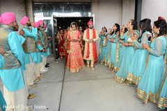 Indian bride and groom walking out the wedding ceremony capture. Indian bride and groom walking out the wedding ceremony capture.