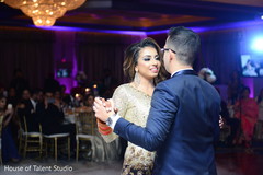 Gorgeous Indian bride and groom at their wedding reception dance. Gorgeous Indian bride and groom at their wedding reception dance.
