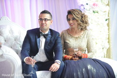Adorable indian love birds at wedding reception. Adorable indian love birds at wedding reception.