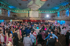 Indian wedding guests rocking the dance floor. Indian wedding guests rocking the dance floor.