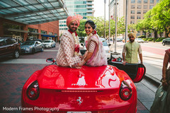Lovely capture of indian bride and groom on their wedding car Lovely capture of indian bride and groom on their wedding car
